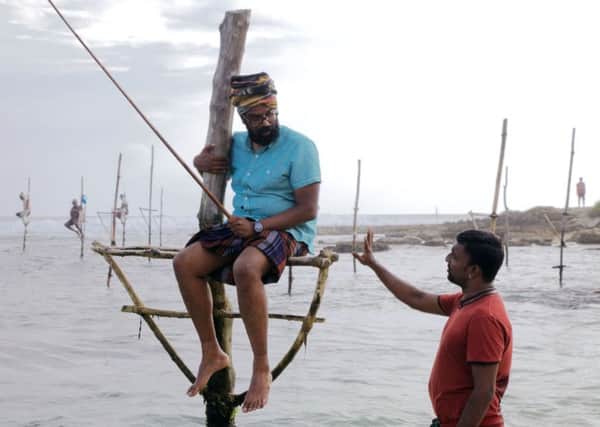 Romesh Ranganathan attempts to get in touch with his Sri Lankan heritage with a bit of stilt fishing