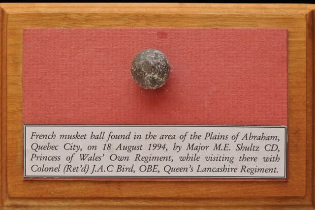 French Musket Ball found on the Plains of Abraham, Quebec City by Major Mike Shultz, The Princess of Waless Own Regiment, and Colonel John Bird, Regimental Secretary  The Queens Lancashire Regiment on August 18 1994.