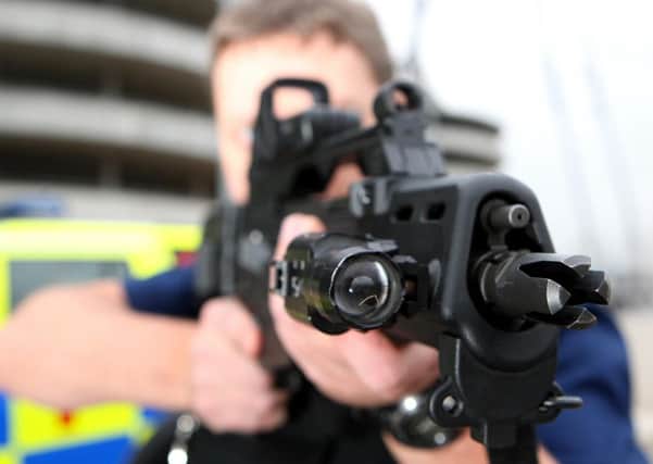 A members of the Greater Manchester Police armed response unit. Photo: Martin Rickett/PA Wire
