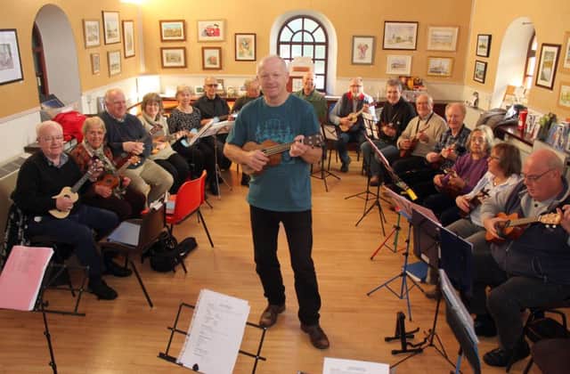 Garstang Ukelele Group at Gartsang Arts Centre. The Ukelele group started up at the beginning of October and have now 25 members who meet up. Pictured are members of the group during the practice session at the Arts Centre. 22nd November 2015