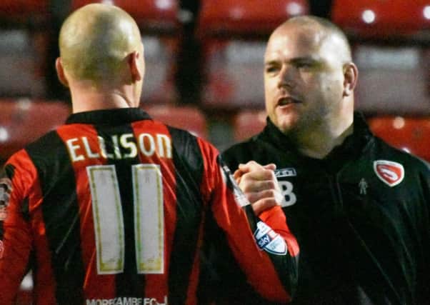 Jim Bentley and Kevin Ellison celebrate the win over Dagenham.