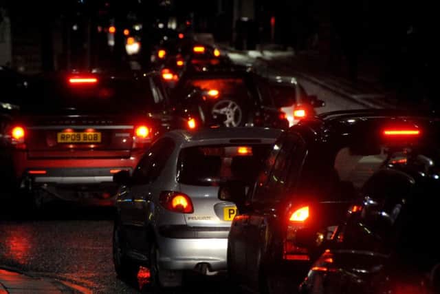 Traffic queuing on Bulter Street in Preston, where commuters and shoppers battle to exit Preston via Fishergate