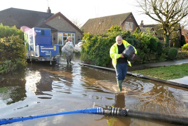 Road closures and damage to homes in St Michaels after Storm Desmond caused flooding in the area