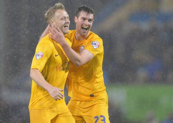 Preston North End's Tom Clarke and Paul Huntington celebrate after Daniel Johnson's second goal at Derby