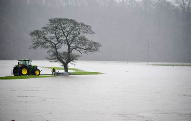 Flooded farmland near Ribchester  a correspondent says EU funding is available for flood victims. See letter