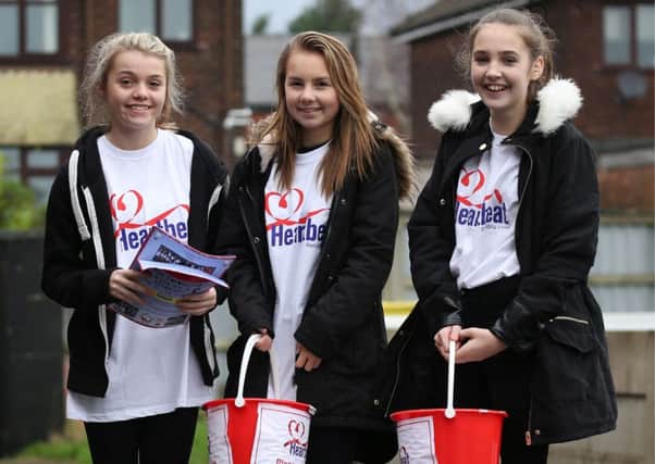 Madyson Kehoe, Katie Crossley and Morgan Brown raised cash for Bamber Bridge FC