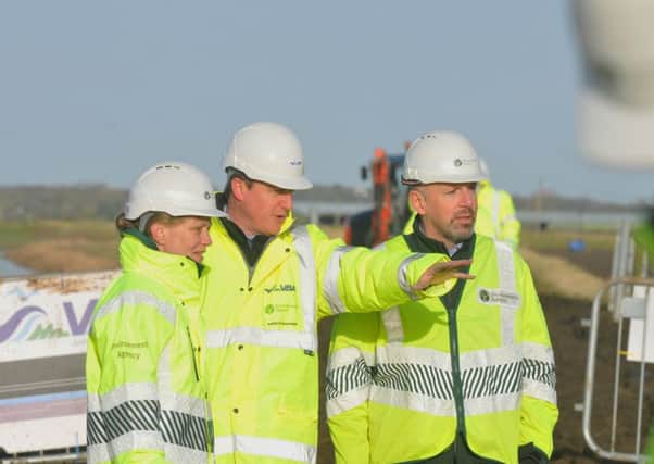David Cameron visits flood defences at Croston