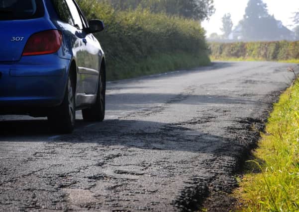 Some Lancashire drivers were compensated for damage caused by potholes. See letter on compensation claims
