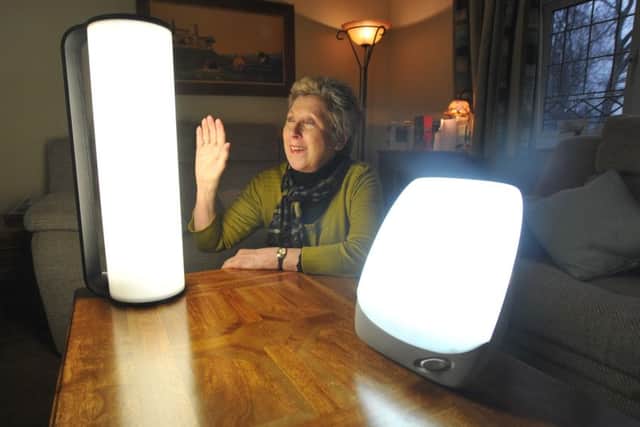 Photo Neil CrossSAD sufferer Beverley Bunting with her lightboxes