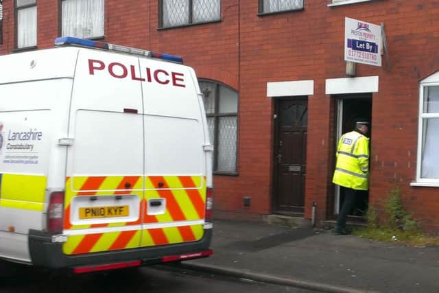 Trafficking raid: Police at a house in Longworth Street, to arrest suspected human traffickers