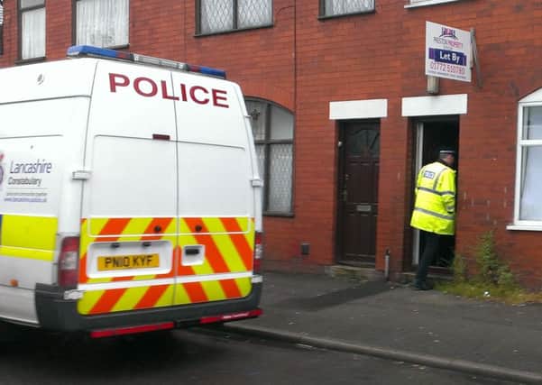 Trafficking raid: Police at a house in Longworth Street, to arrest suspected human traffickers