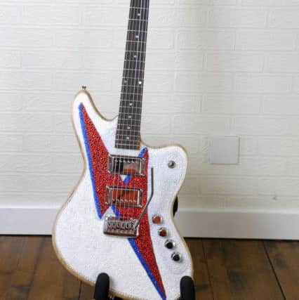 Anthony Helps has made a David Bowie tribute guitar and is putting up for auction to raise money for Cancer Research