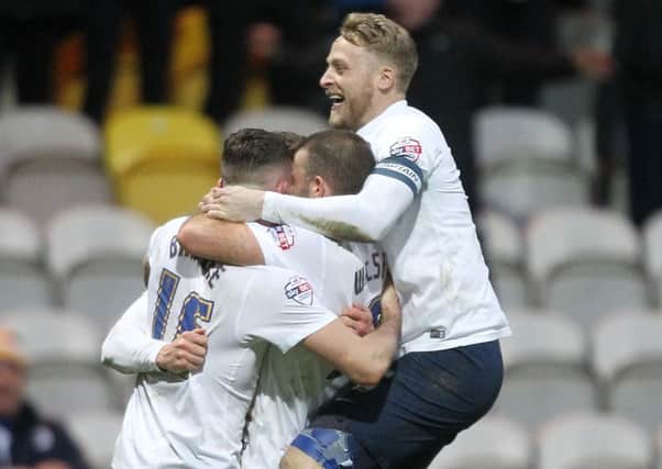 Alan Browne celebrates his winner with Tom Clarke and John Welsh