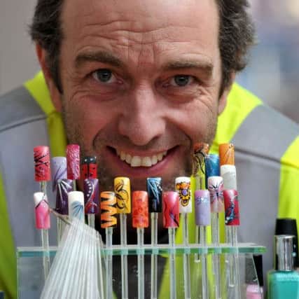 Photo Neil Cross
REAL LIFE STORY - Andrew and Julie Doublett 
Hammer and nails ... Builder Andrew Doublett is also a nail technician and does acrylic nails, gels nails with his wife Julie at Nature's Way, Tulketh Brow, Preston