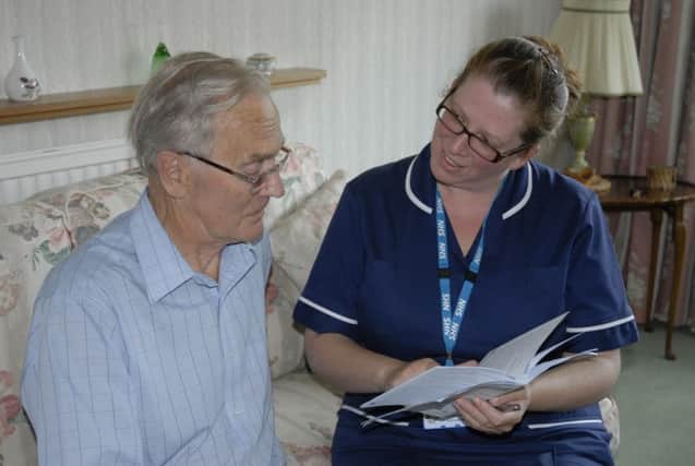 Karen Palmer, clinical research nurse manager at Lancashire Care NHS Foundation. Karen with a patient.
