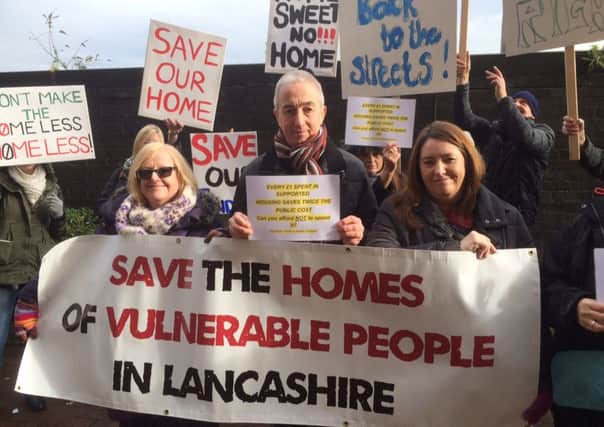 Vocal: Housing protesters outside County Hall, Preston, ahead a full council meeting to dicuss budget cuts
