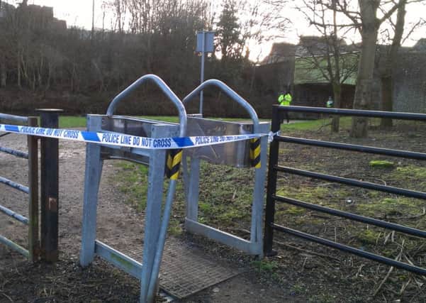 The sealed off area next to the Leeds and Liverpool Canal at Cowling Brow, Chorley, where a man's body was found.