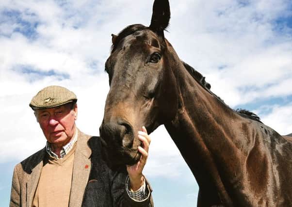 Trevor Hemmings with Grand National winner Many Clouds