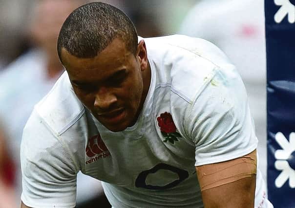 Jonathan Joseph scores England's third try during their 40-9 victory in Italy