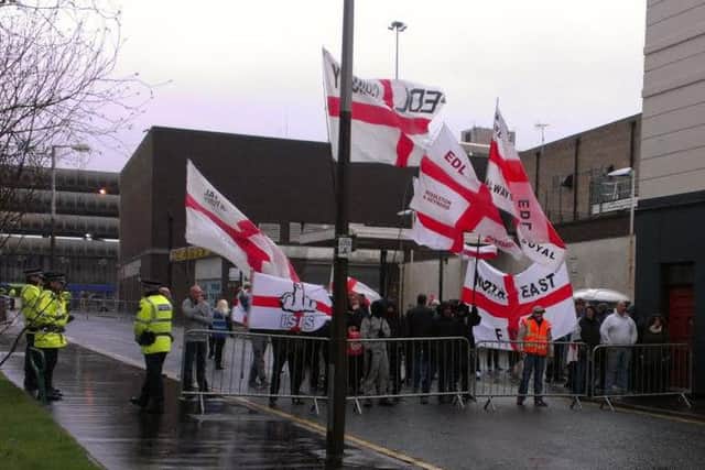 Members of the EDL gather at the Blackamoor Head pub in Preston