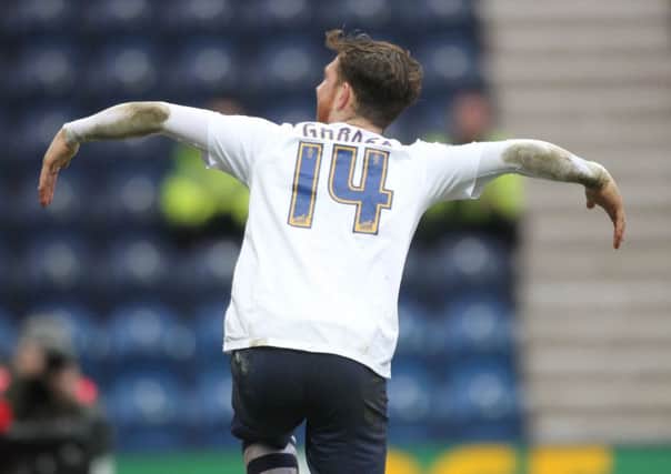 Joe Garner clebrates scoring against Sheffield Wednesday