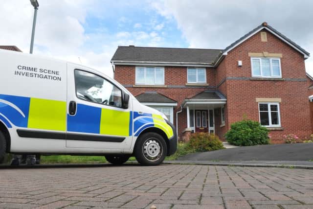 Police outside the Edwards' home in Chorley
