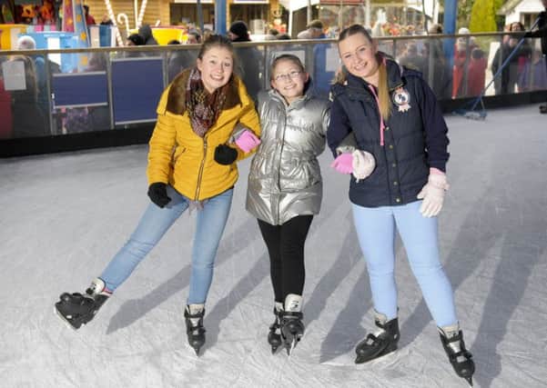 Ice week for half term at Guy's Thatched Hamlet. Pictured L-R are Aimee Snellgrove, 21, Jessica Snellgrove, 10 and Lucy Snellgrove, aged 17.