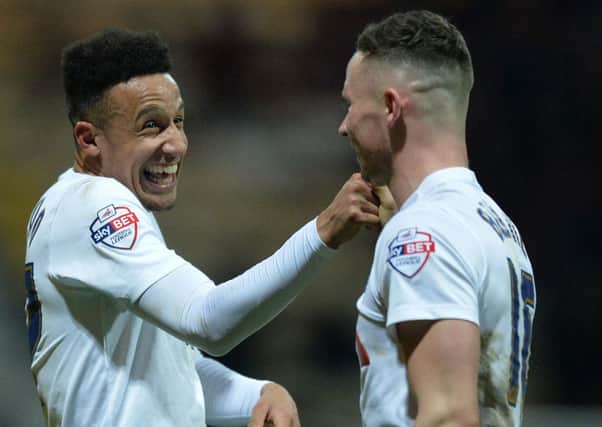 Robinson (left) is all smiles as he celebrates scoring PNE's winner against Charlton with Alan Browne