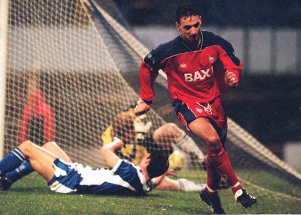 Kurt Nogan turns to celebrate after scoring in PNE's 4-0 win at Cardiff in January 2000