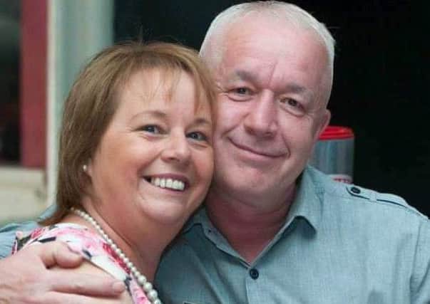 Julie Billington, who has received the all clear after battling breast cancer for 10 years.
Julie with her husband Mark who first alerted her to the fact he had felt a lump after reading about Kylie Minogue's diagnosis