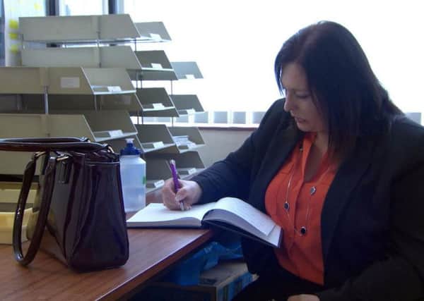 Programme Name: Who's the Boss? - TX: n/a - Episode: Beech's (No. 2 - Beech's) - Picture Shows: One of the candidates doing her research. Karen Todd - (C) BBC - Photographer: Screen grab