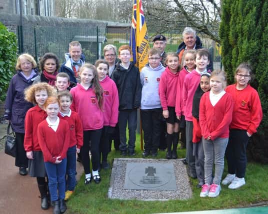 Children from Bowerham Primary School with the new VC stone