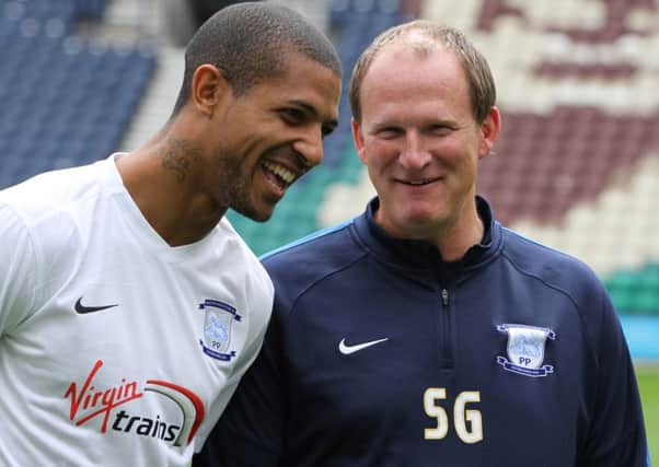 Jermaine Beckford and PNE manager Simon Grayson