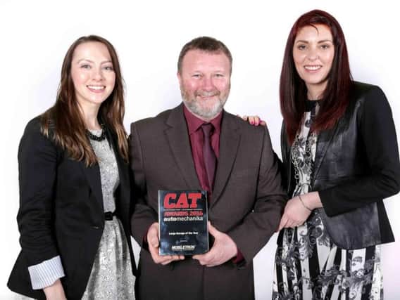 Tony Waring receives the Weldbank Garages award