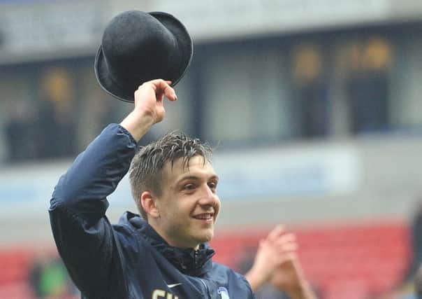 Jordan Hugill salutes the Preston fans after the victory at Bolton