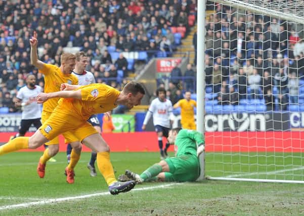 Marnick Vermijl celebrates after Eoin Doyle's touch leaves Bolton's Paul Rachubka stranded for the winning goal