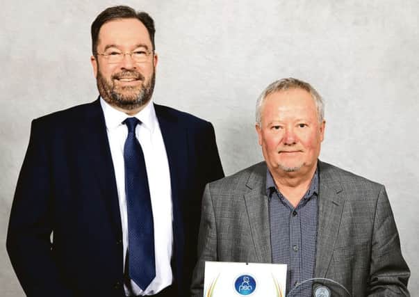 Lifetime achievement winner Tony Rigby (right) with Martin Whittle (John Turner Construction Group)