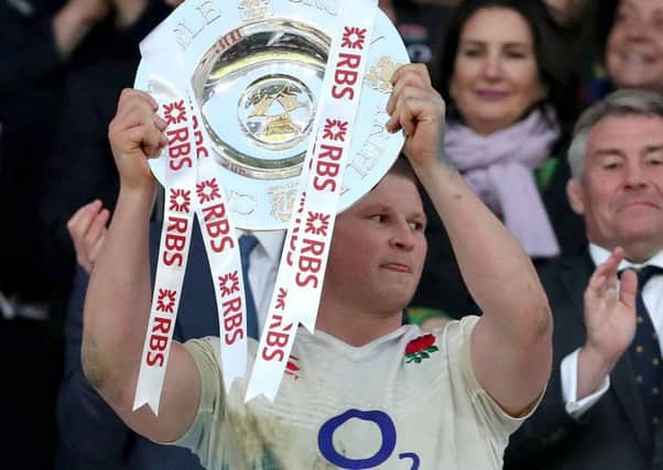 England captain Dylan Hartley lifts the Triple Crown trophy after the Six Nations victory over Wales last Saturday and now they want the Grand Slam