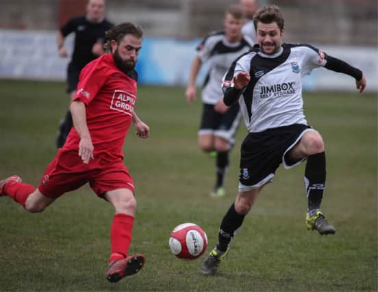 Ally Waddecar tries to stop a Droylsden attack