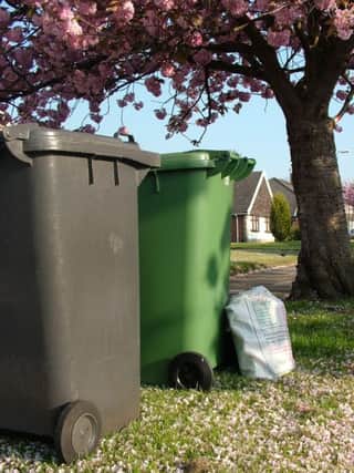 A reader disagrees with the proposal to charge Â£30 for collecting green waste. See letter