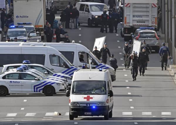 An ambulance leaves Maelbeek metro station. Pic: AP Photo/Martin Meissner