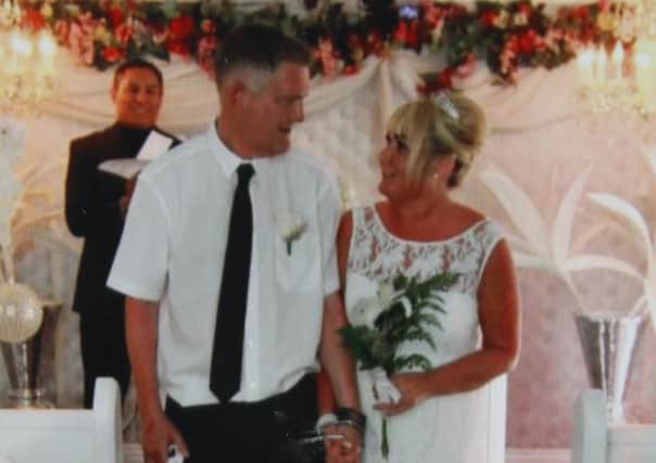 TROUBLE BREWING:  David and Sharon Edwards on their wedding day