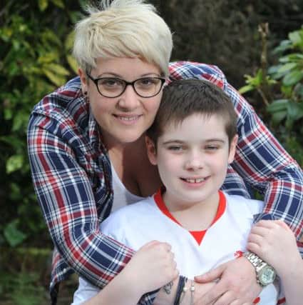 Ewan Bradley pictured with his mum Fiona
