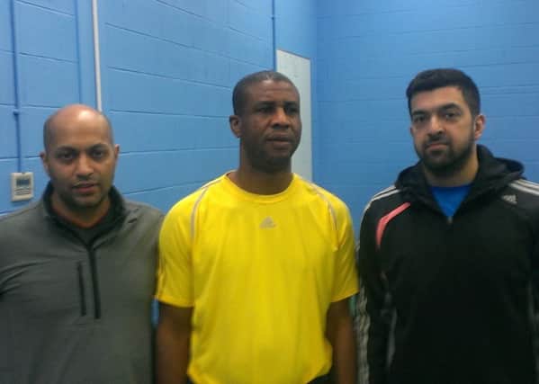 Premier Division Cup winners Ashton Meths A (from left) Khamal Hussain, Charles Musa and Majid Tubasum