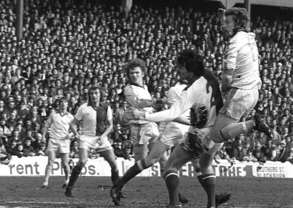 Alex Bruce volleys Preston's winner against Blackburn in March 1979, watched by team-mate Eric Potts