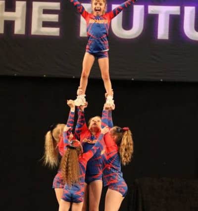 The Infinity Cheer, part of a Youth Level 2 stunt group, Sophie Gardner aged 10, Keira Benneworth ,10, Poppy McGovern ,10,  nine-year-old Anya McLoughlin and Lois Barrow, seven , scooped first place in the Future Cheers Heart of England National competition at the LG Arena (NEC) in Birmingham.