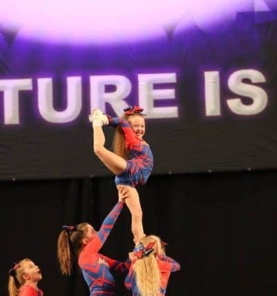 The Infinity Cheer, part of a Youth Level 2 stunt group, Sophie Gardner aged 10, Keira Benneworth ,10, Poppy McGovern ,10,  nine-year-old Anya McLoughlin and Lois Barrow, seven , scooped first place in the Future Cheers Heart of England National competition at the LG Arena (NEC) in Birmingham.