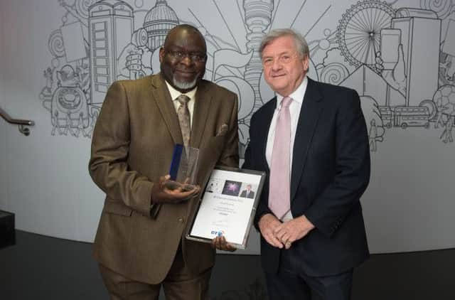 Fletcher Kusaloka received the Social Innovation of the Year award at the BT Chairmans Awards from BT chairman Sir Michael Rake.