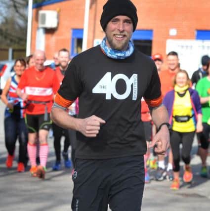 Photo Neil Cross
Ben Smith, touring the country running 401 marathons in 401 days, running a marathon in Preston and Bamber Bridge with loads of local runners joining him.