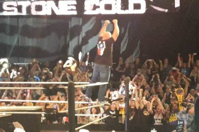 Stone Cold Steve Austin makes an appearance at the WWE Axxess event.